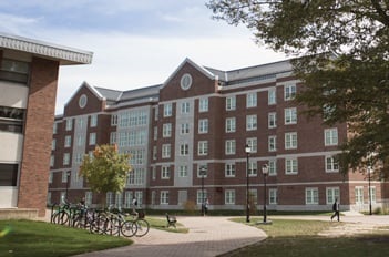 A large brick building on a university campus.